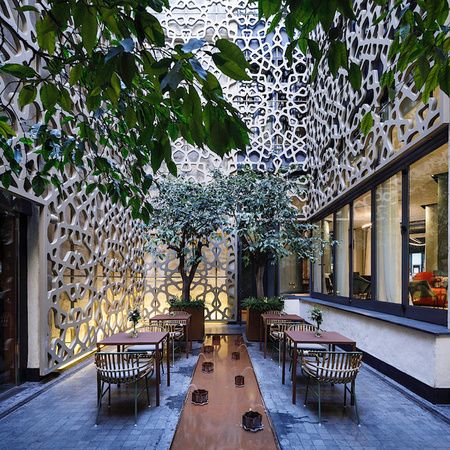 Orange Tree Courtyard at the EME Catedral Mercer Hotel