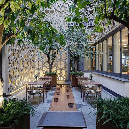 Orange Tree Courtyard at the EME Catedral Mercer Hotel