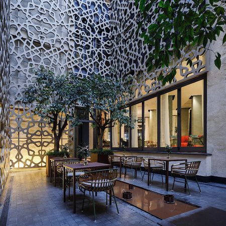 Orange Tree Courtyard at the EME Catedral Mercer Hotel