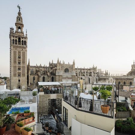 Terrace, pool and solarium of the EME Catedral Mercer Hotel